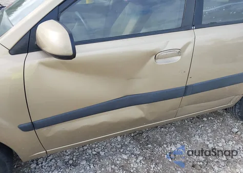 2009 Kia Rio Lx z USA, uszkodzony, nr VIN KNADE223196510080